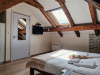 Dvokrevetna soba u potkrovlju