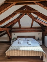 Dvokrevetna soba u potkrovlju